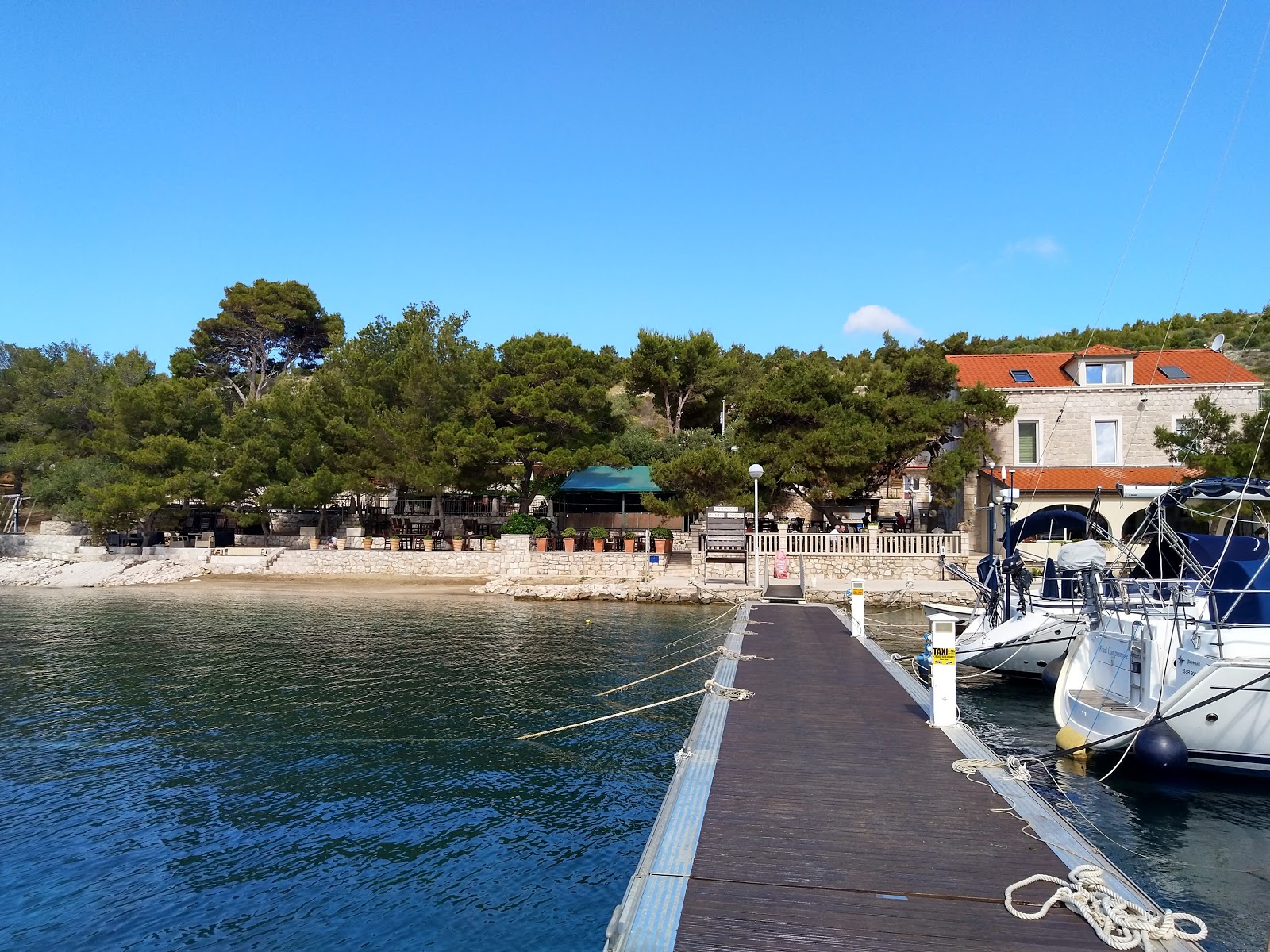 Foto di Porto Rosso beach area del resort sulla spiaggia