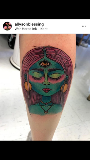 Explore ribbon tattoo ideas, creative tattoo ideas in Kent, available at War Horse Ink