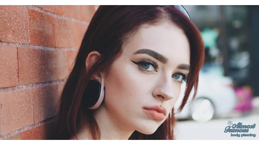 Explore tattoo ideas for deceased brother, creative tattoo ideas in Fargo, available at Almost Famous Body Piercing