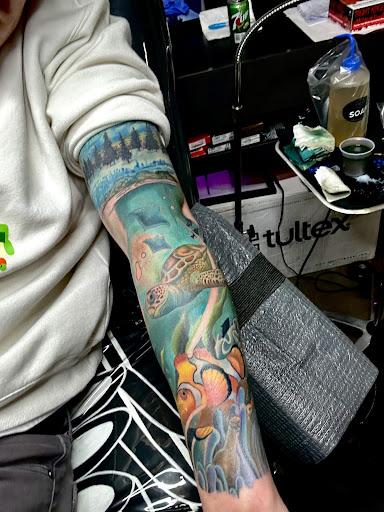 Explore beatles tattoo ideas, creative tattoo ideas in Austin, available at Aura IV Tattoo Gallery