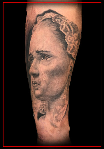 Explore saint tattoo ideas, creative tattoo ideas in Omaha, available at Eternal Tattoo & Body Piercing - Omaha