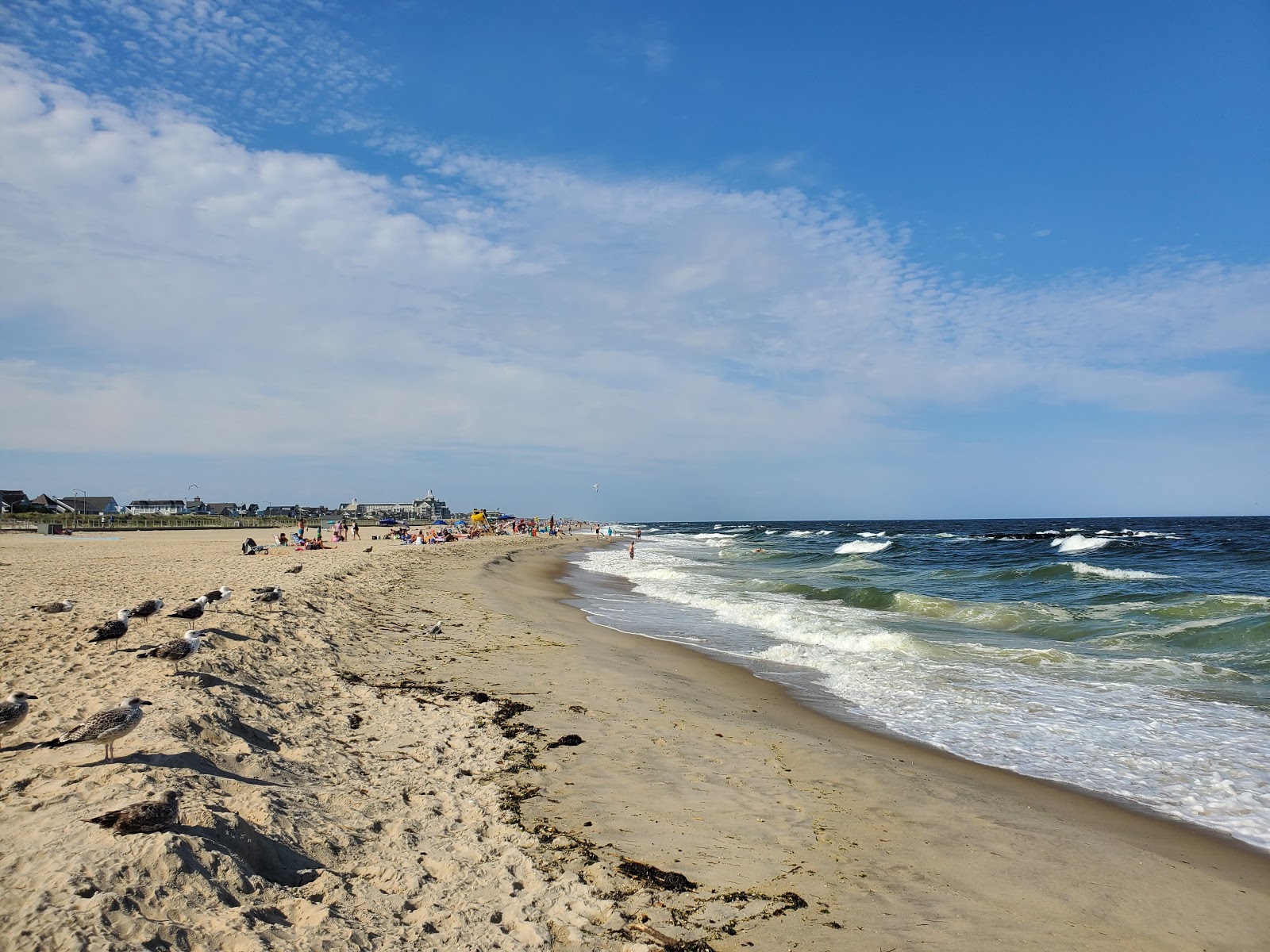 Zdjęcie Pier Beach z powierzchnią beżowy piasek