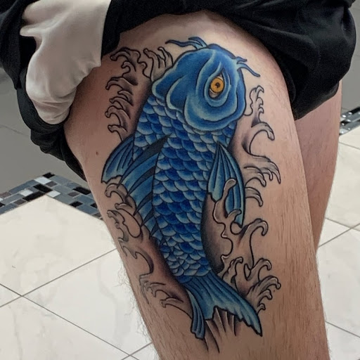 Explore ski tattoo ideas, creative tattoo ideas in Schaumburg, available at Atmosphere Tattoo Gallery - Schaumburg