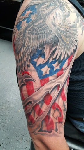 Explore tattoo flower sleeve ideas, creative tattoo ideas in Wichita, available at Body Canvas Tattooing