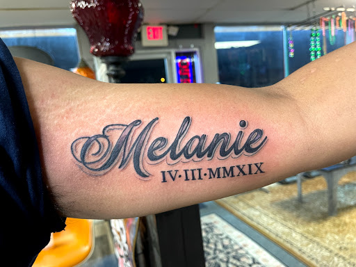 Explore mardi gras mask tattoo ideas, creative tattoo ideas in Livingston, available at Voodoo Tattoo Company