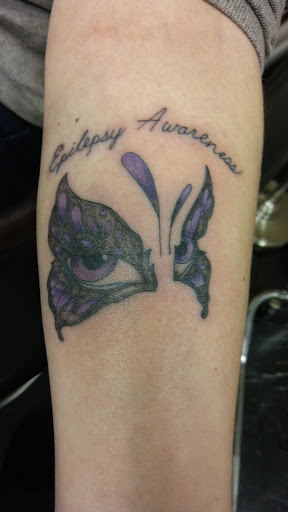 Explore hitchhiker's guide to the galaxy tattoo ideas, creative tattoo ideas in Overland Park, available at Inkslingers Tattoo Studio