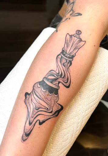 Explore little ghost tattoo ideas, creative tattoo ideas in Washington, available at Fattys Tattoos & Piercings H Street