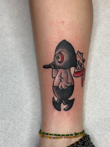 Explore female thigh tattoo ideas, creative tattoo ideas in Dallas, available at Cedar Springs Tattoo & Piercing