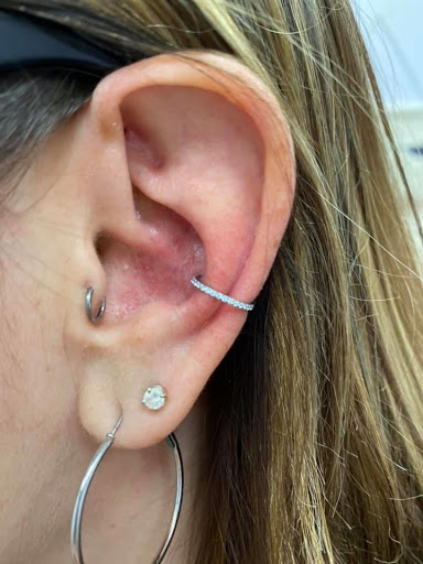 Explore neck word tattoo ideas, creative tattoo ideas in Aledo, available at Elevated Tattoo & Piercing