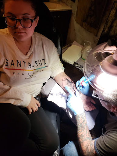 Explore small flower tattoo ideas, creative tattoo ideas in Santa Cruz, available at Good Omen Tattoo