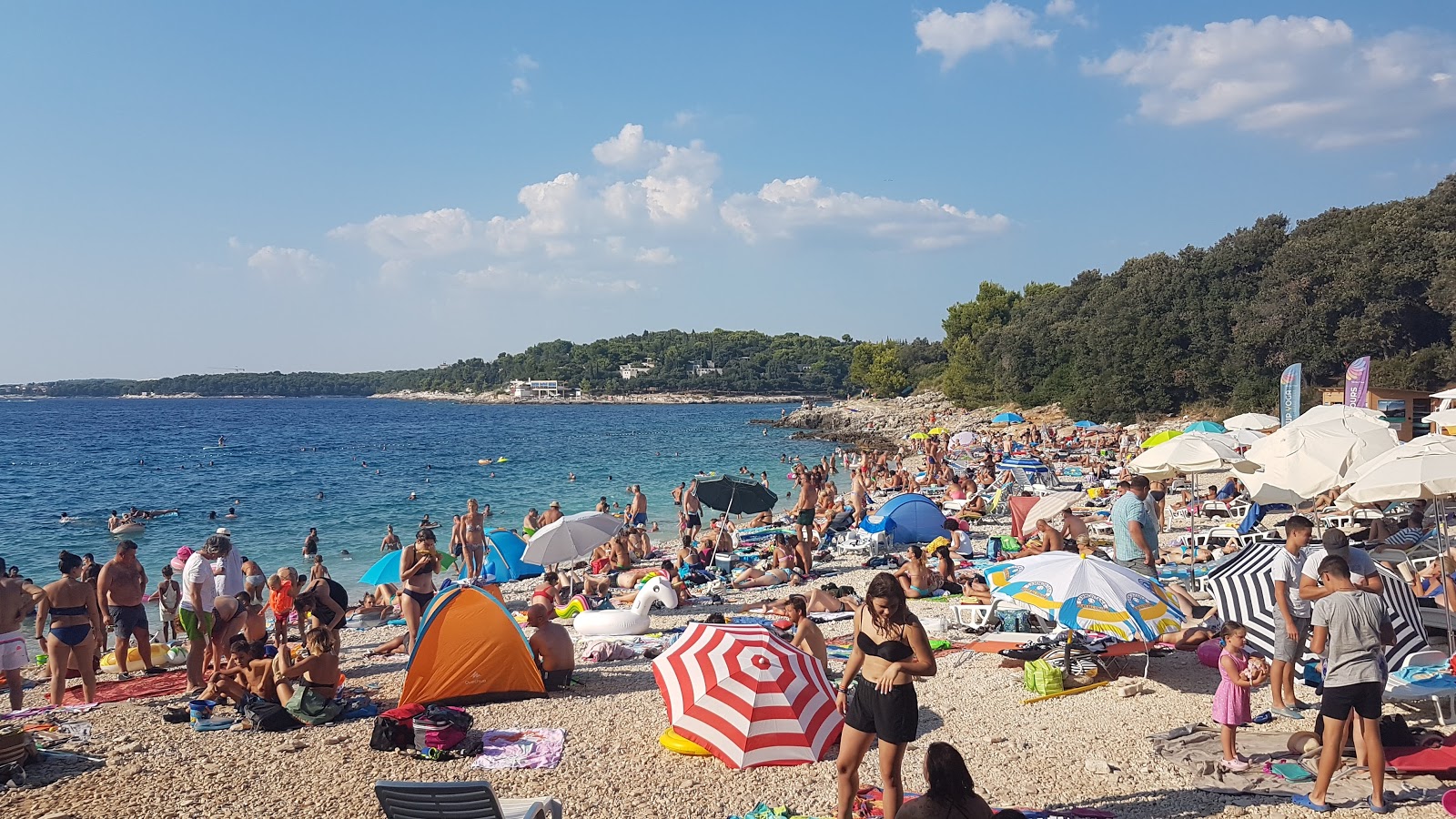 Fotografie cu Ambrela beach - recomandat pentru călătorii în familie cu copii