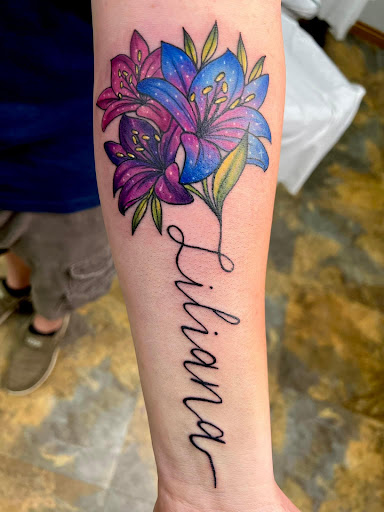 Find tattoos under the breast ideas for your next unique tattoo in Adrian at Good Life Tattoo Co.
