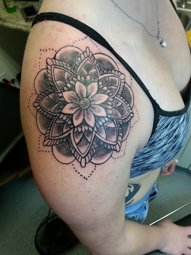 Explore black and white tattoo ideas for men, creative tattoo ideas in Spencer, available at Ink Envy Tattoo And Body Piercing