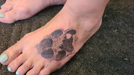 Explore push tattoo ideas, creative tattoo ideas in Newburgh, available at Outlaw Ink