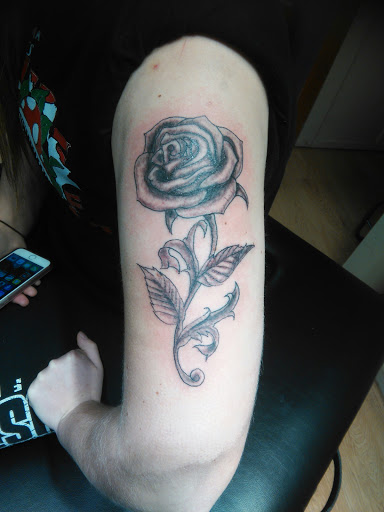 Explore hobbit tattoo ideas, creative tattoo ideas in La Crosse, available at La Crosse Tattoo