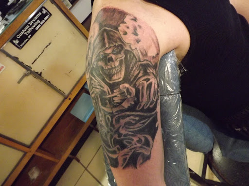 Explore gambling tattoos ideas, creative tattoo ideas in Princeton, available at Custom Dreams Tattooing and Body Piercing