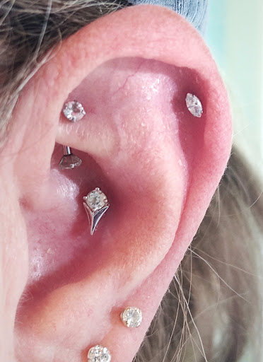 Explore rose name tattoo ideas, creative tattoo ideas in Bella Vista, available at Erins Aesthetics