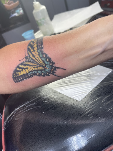 Explore tattoo ideas for lost loved ones, creative tattoo ideas in Whiteville, available at Coup de Gras 2.0 Tattoo and Body Piercing