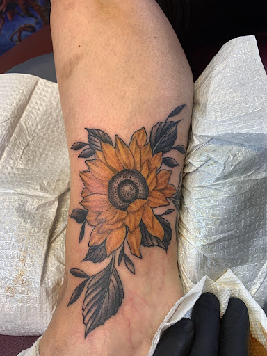 Explore wall-e tattoo ideas, creative tattoo ideas in Fall River, available at Indelible Ink Tattoo Studio 2.0