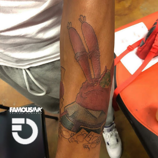 Explore men tattoo ideas leg, creative tattoo ideas in Hammond, available at Famous Ink, Inc.