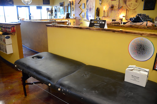 Explore head tattoo ideas male, creative tattoo ideas in Oak Grove, available at NeverMore Galleries Tattoo Studio