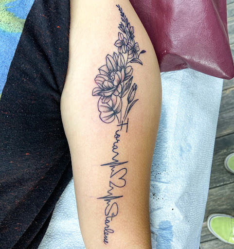Explore hunting sleeve tattoo ideas, creative tattoo ideas in El Paso, available at American Tattoo Society of Ft Bliss