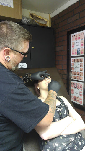 Explore ecuadorian tattoo ideas, creative tattoo ideas in Dover, available at Walls of Wonder Tattoo And Body Piercing