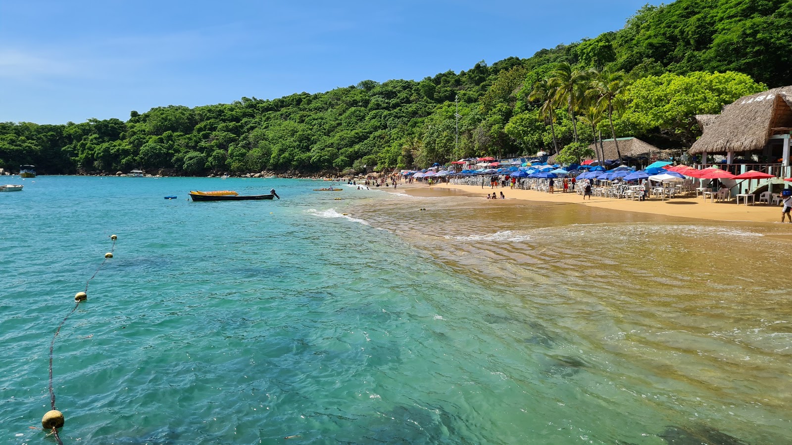 Foto von Playa La Roqueta mit feiner beiger sand Oberfläche