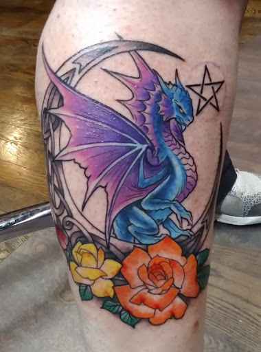 Explore feminine leg tattoo ideas, creative tattoo ideas in Council Bluffs, available at Black Squirrel Tattoo