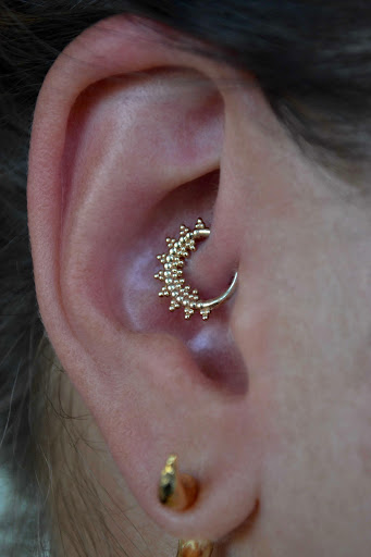 Explore back arm tattoo ideas for guys, creative tattoo ideas in Aurora, available at Bespoke Piercing & Jewelry (Inside Bonaroo Tattoo)