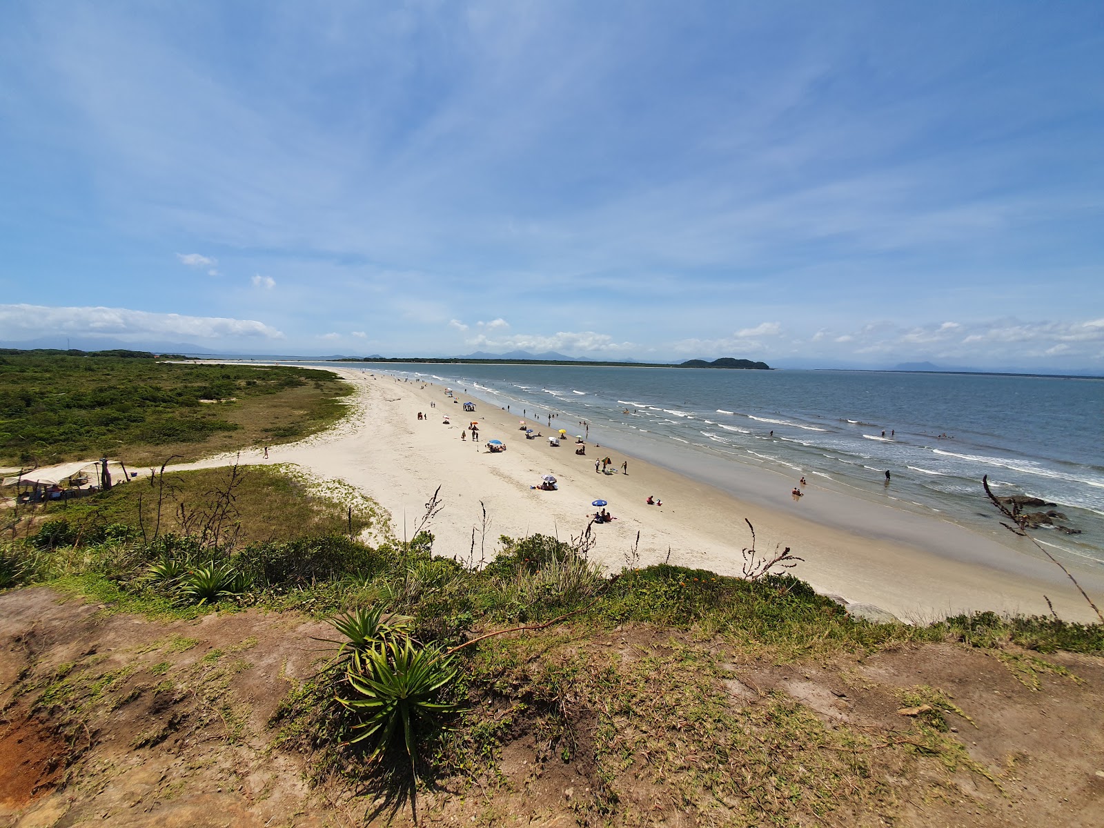 Photo de Plage de Farol avec sable fin et lumineux de surface