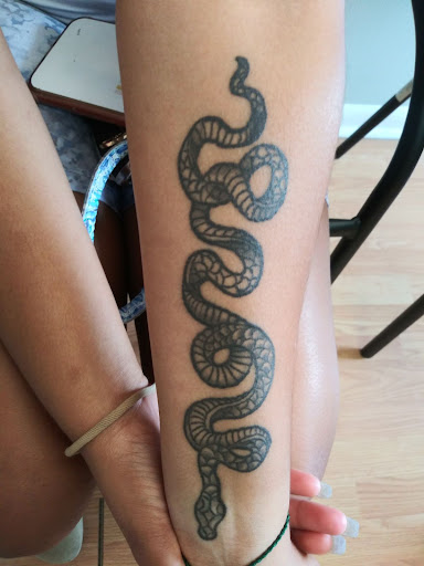 Explore sleep token tattoo ideas, creative tattoo ideas in Ozark, available at Tooth & Nail Tattoo & Piercing