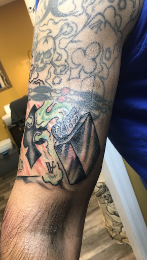 Explore tattoo sleeve filler ideas for a man, creative tattoo ideas in Warner Robins, available at Untold Pain Tattoo Studio