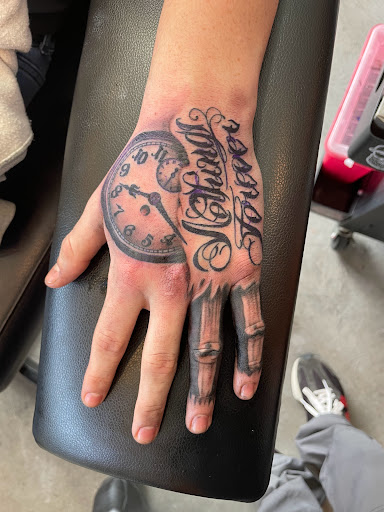 Find alpha and omega tattoo ideas for your next unique tattoo in Great Falls at Alpha Tattoos & Piercings