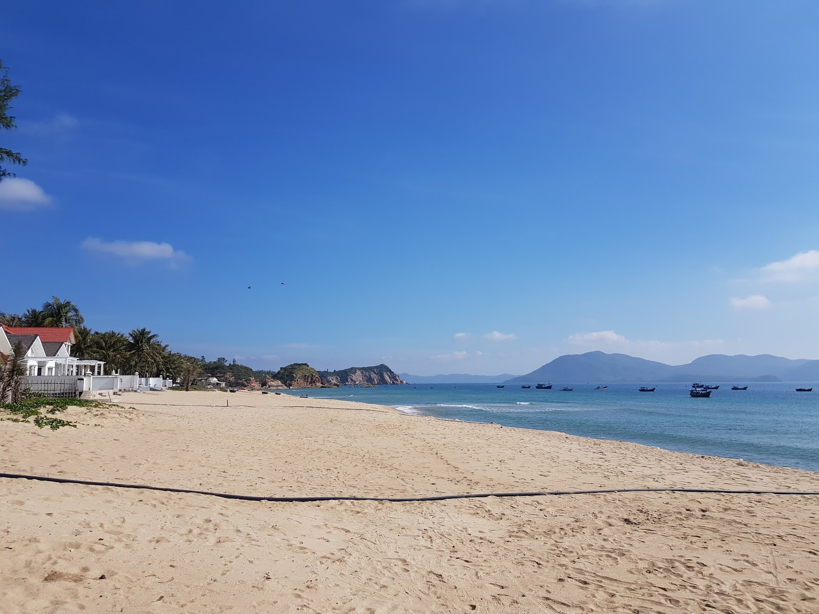Fotografija Ganh Do Beach z svetel pesek površino