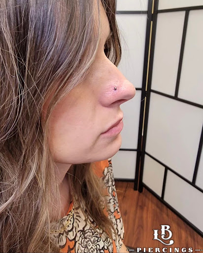 Explore love and war tattoo ideas, creative tattoo ideas in Plainfield, available at Boundless Tattoo Company