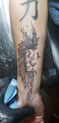 Explore first tattoo ideas for black females, creative tattoo ideas in Cornelia, available at Prismatic Pulse Tattoo