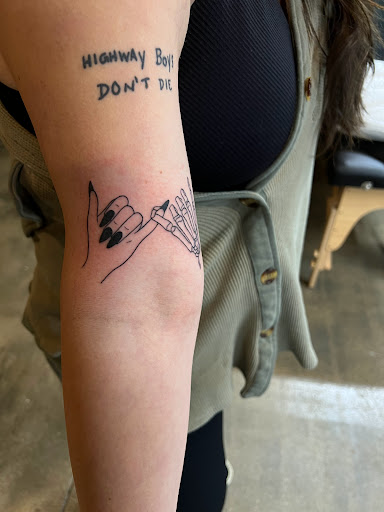 Find best friend/sister tattoo ideas for your next unique tattoo in Bloomington at Crystal Moon Body Arts
