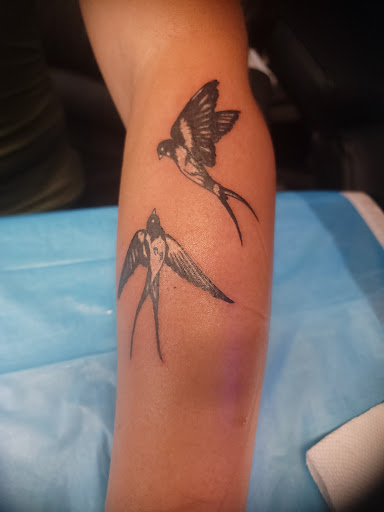 Explore sleep token tattoo ideas, creative tattoo ideas in Portsmouth, available at GREGS TATTOOS LLC