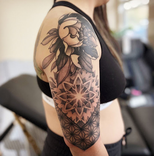 Explore birthday year tattoo ideas, creative tattoo ideas in Port Orange, available at Electric Shark Tattoo Studio