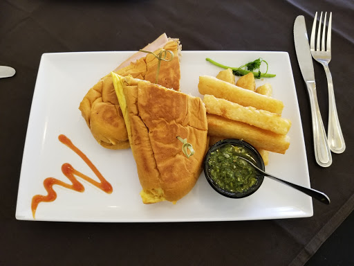 Latin American Restaurant «De La Vega Restaurante y Galeria», reviews and photos, 128 N Woodland Blvd, DeLand, FL 32720, USA