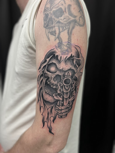 Explore picasso tattoo ideas, creative tattoo ideas in Cadillac, available at Limitless Ink Tattoo Studio