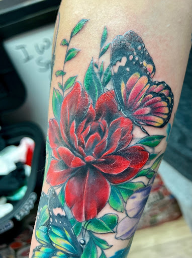 Explore minimalist tattoo ideas for men, creative tattoo ideas in Jefferson, available at Slammin Ink Tattoo