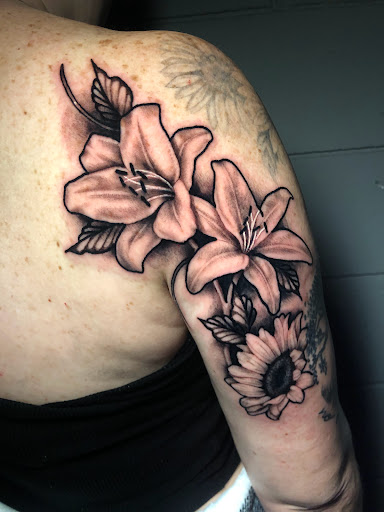 Explore tattoo ideas on belly, creative tattoo ideas in Adrian, available at Ambition Ink