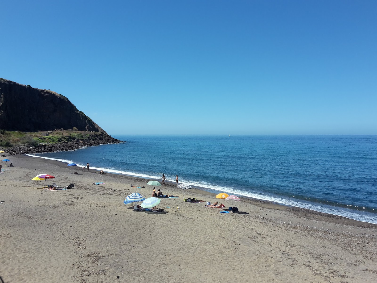 Foto van Turas beach met gemiddeld niveau van netheid