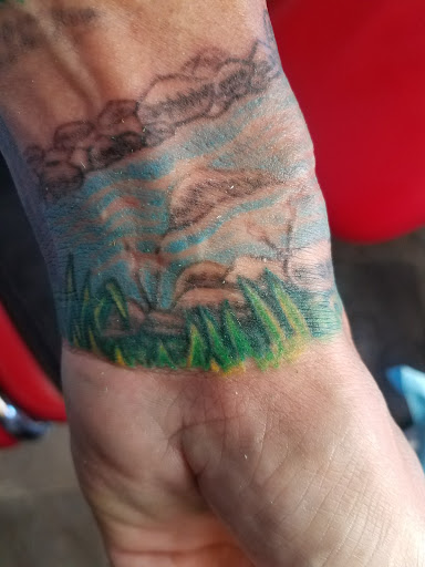 Tattoo Shop «Integrity Tattoos», reviews and photos, 324 N Illinois St, Belleville, IL 62220, USA