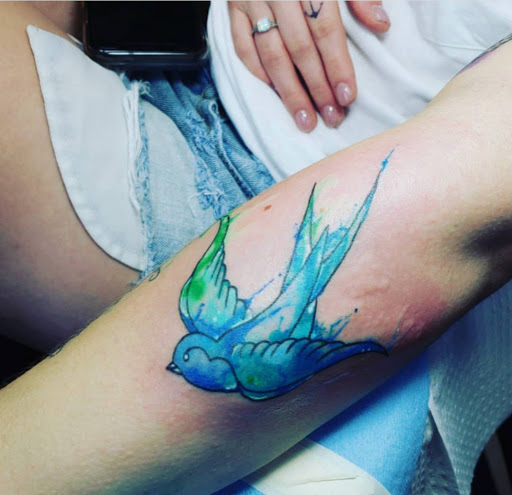 Explore guy hand tattoo ideas, creative tattoo ideas in Kenosha, available at Kenosha Tattoo Company