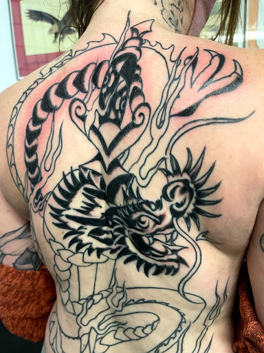 Explore big flower tattoo ideas, creative tattoo ideas in Concord, available at Sterling Tattoo Club