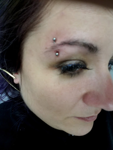 Explore small fingerprint tattoo ideas, creative tattoo ideas in Providence, available at Rockstar Body Piercing