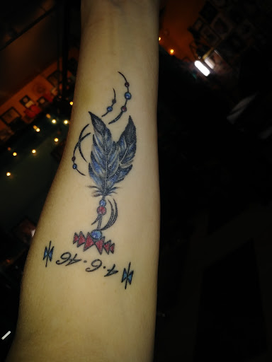 Explore candle tattoo ideas, creative tattoo ideas in Minneapolis, available at Sacred Siren Tattoo & Art Parlor